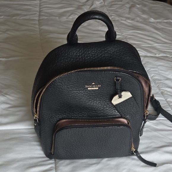 kate spade Handbags - kate spade Black Pebbled Leather Mini Backpack with Gold Accents